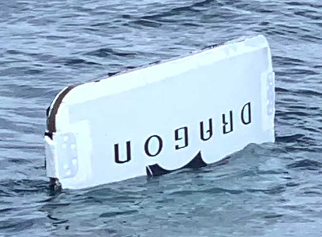 Fisherman catches door of SpaceX capsule off Daytona Beach