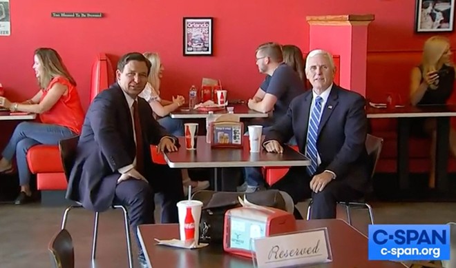 Pence visited Beth's Burger Bar with Gov. Ron DeSantis in Orlando on May 21. - Screenshot via CSPAN