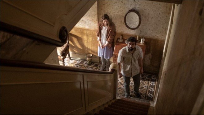 Tomas prepares to go upstairs and check on Magda's mother, who is locked in a room and dying. Trust us, that's not a good idea. - NICK WALL/MAGNET RELEASING