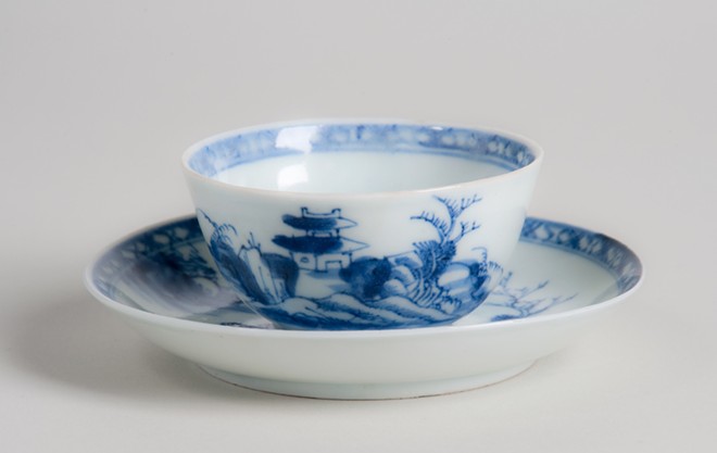 Unknown maker, Chinese, the "Nanking Cargo" from the Geldermalsen (a cargo ship with the Dutch East India Trading Company), Riverscape pattern, tea bowl and saucer, 2 in. (5 cm) in height, porcelain, gift of Dr. Benjamin L. Abberger Jr. and Nancy Hardy Abberger Collection, c. 1752. - Courtesy of The Charles Hosmer Morse Museum of American Art, Winter Park, FL.