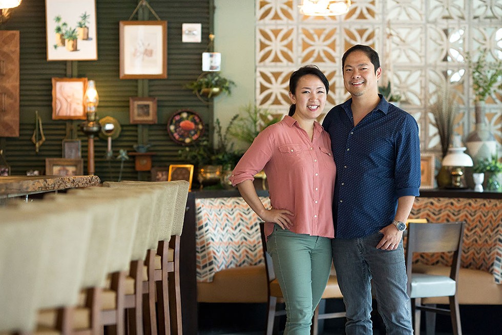 Sue and Jason Chin at Reyes Mezcaleria, one of their restaurants. - Photo by Rob Bartlett