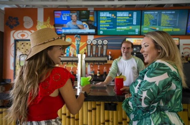 A look at the inside of the Hang Ten Tiki Bar - Image via Adventure Island