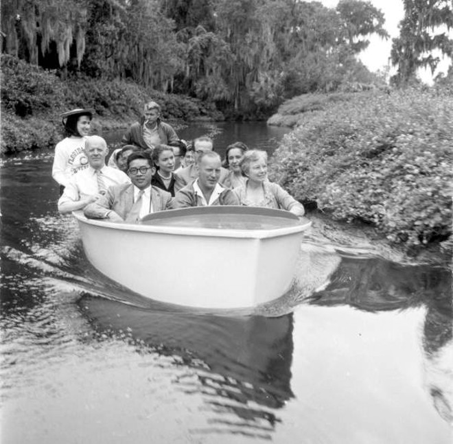 A group of international teachers take in the sights of the Cypress Gardens boat tour in 1958. Accompanying note on the image identifies the teaches as 1st row: Mr. Hen Seang Moey, Singapore, Mr. Leslie Johnson, Australia, Mrs. Marian Black, Tallahassee, 2nd row: Mr. Johannes Helgheim, Norway, Miss Claudia Thonnard, Sec., Mr. Mario Maricchio, Italy (& wife) Left rear: Miss Elsa Morales, Mexico. - Image via Jim Stokes | State Archives of Florida, Florida Memory