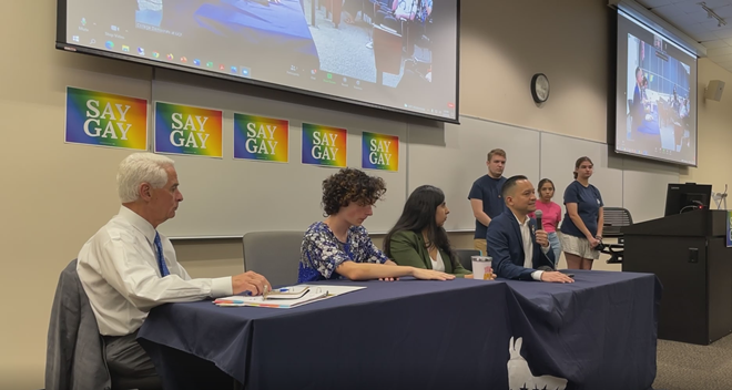 State Rep. Carlos Guillermo Smith (far right at table) speaks against the "Don't Say Gay" bill along with other representatives, LGBTQ+ activists and students at a panel discussion on Wednesday. - "Say Gay Panel and Speak Out" Facebook livestream