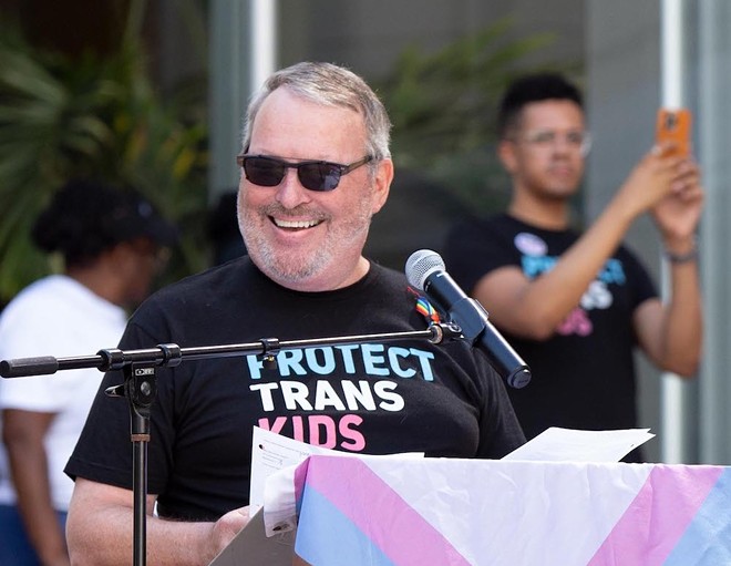 Not all Florida leaders are fuckwits: Mayor Buddy Dyer sported a "Protect Trans Kids" T-shirt in 2022. - PHOTO BY J.D. CASTO