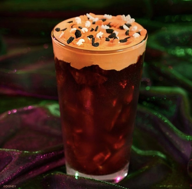 Vanilla cold brew coffee topped with pumpkin spiced foam and sprinkles. - Via @DisneyParks on Instagram