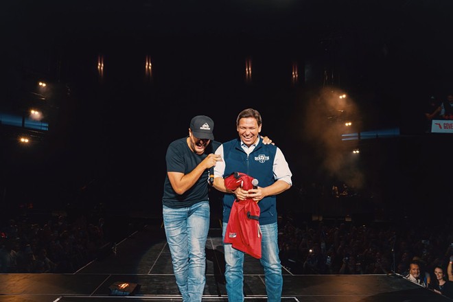 Country singer Luke Bryan welcomed Florida Gov. Ron DeSantis on stage at his show in Florida. - Florida Gov. Ron DeSantis/Twitter