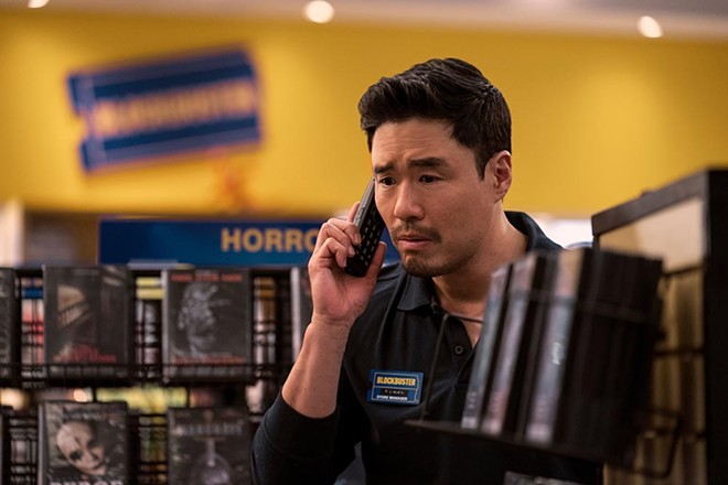 Randall Park as Timmy, who runs the last Blockbuster Video in America in 'Blockbuster' - photo by Ricardo Hubbs, courtesy Netflix