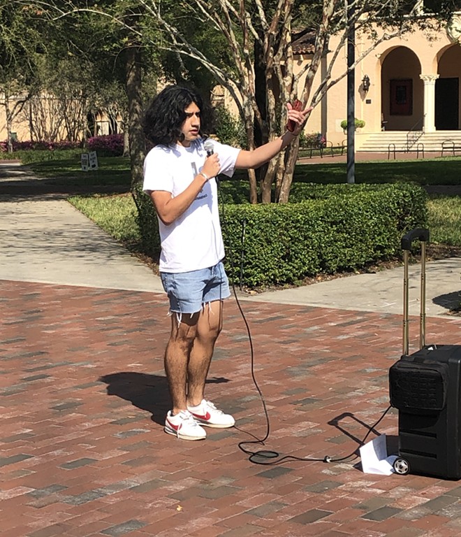A Sodexo dining employee at Rollins College speaks at a student rally in support of dining workers' union rights. - McKenna Schueler/Orlando Weekly