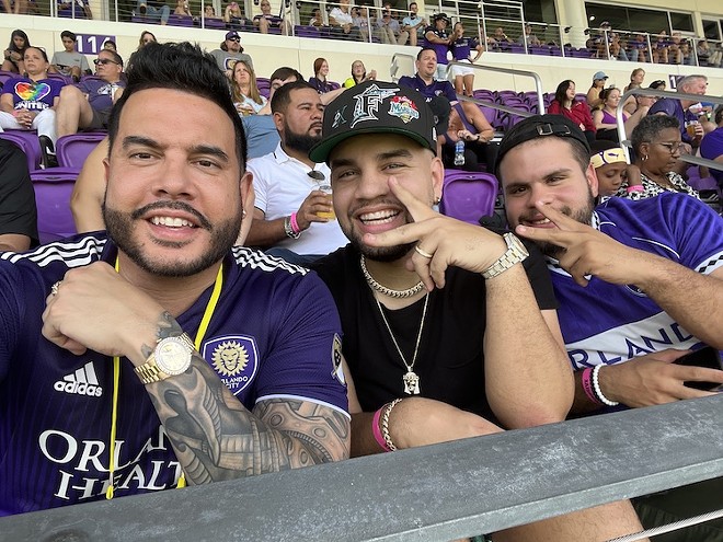 Padilla with his influencer client LeJuan James (center) at an Orlando City soccer game - Courtesy photo