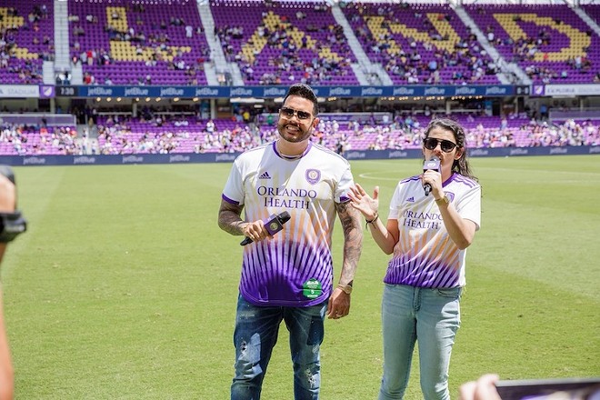Ricky Padilla and Sabrina Ambra of Real Radio are pre-game and half-time emcees at Orlando City Soccer games - Photo by Steven Miller