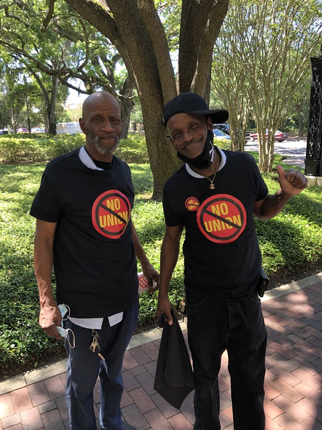Brothers Ronald and Robert Walker, both Sodexo employees, attend a "No Union" rally at Rollins College in Winter Park - McKenna Schueler