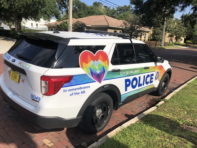 An Orlando Police Department Pulse police cruiser sits parked outside the Orlando abortion clinic. - photo by McKenna Schueler