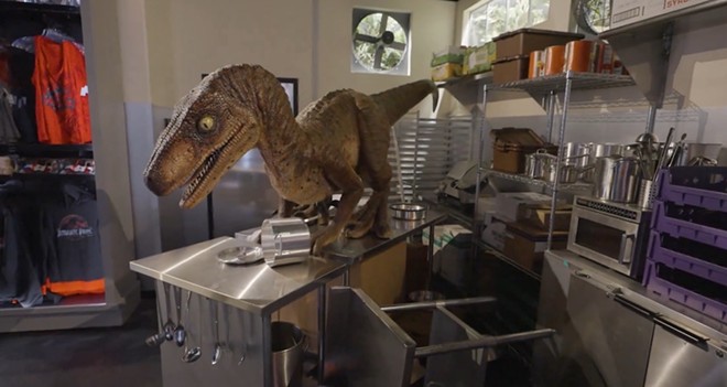 Relive the "velociraptor in the kitchen," now a treasured historic jump-scare - image via Universal Orlando