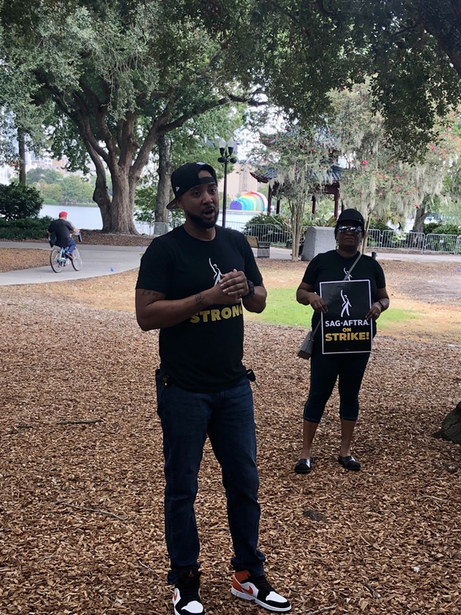 Chris Greene, an actor and founder of a mentorship organization in Central Florida, speaks at a SAG-AFTRA rally in support of entertainment workers. Aug. 10, 2023. - McKenna Schueler