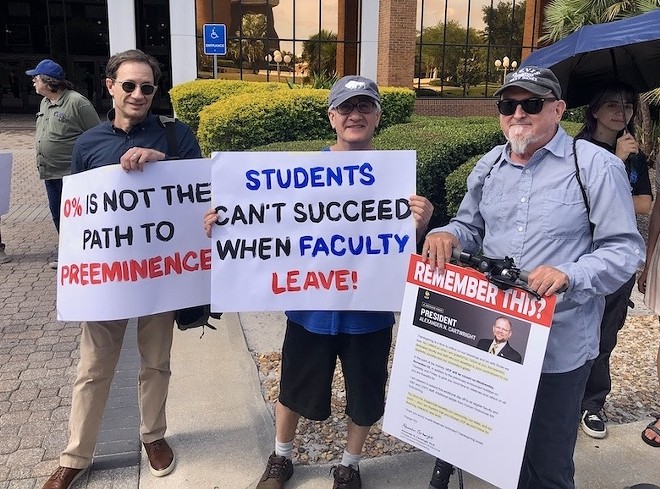 UCF English professors Barry Mauer, Tony Grajeda and Kevin Meehan rally in support of faculty's contributions to student success. (April 17, 2024) - Photo by McKenna Schueler