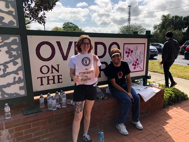 Courtney Thompson (left) stands on the picket line with fellow Starbucks workers at Central Florida's only unionized Starbucks on March 22, 2023. - Photo by McKenna Schueler/Orlando Weekly