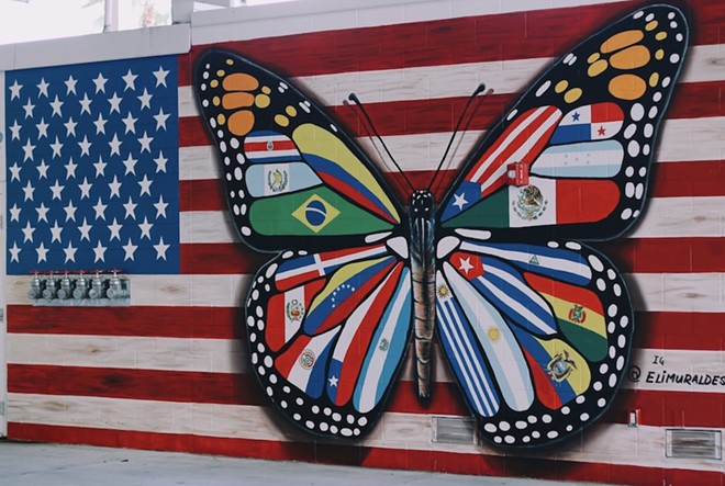 “Vuela Alto Latino,” a mural at Camping World Stadium by @elimuraldesigns. - Photo via City of Orlando/Facebook