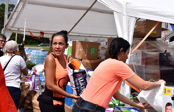 Orlando's Puerto Rican community gathers supplies for the island on Sept. 30. - Photo by Monivette Cordeiro