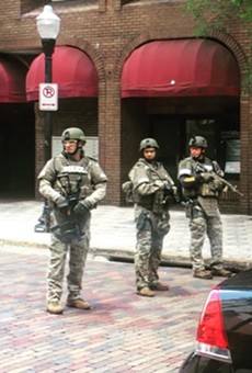 SWAT team action at 55 West: officers were shot at but suspect's gun jammed
