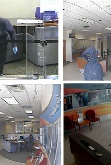 Three men robbed a bank on John Young Parkway this morning
