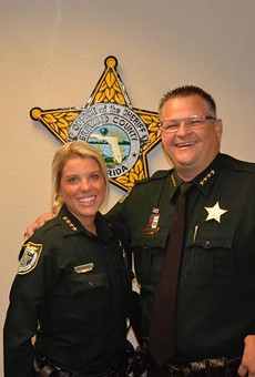 If you don't fit in with the Evangelical motto "In God We Trust," or pretend like you do, well, you can go fuck off. Brevard County Sheriff Wayne Ivey is the bro on the right.