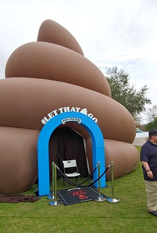 Enormous inflatable poop descends upon Lake Eola Park