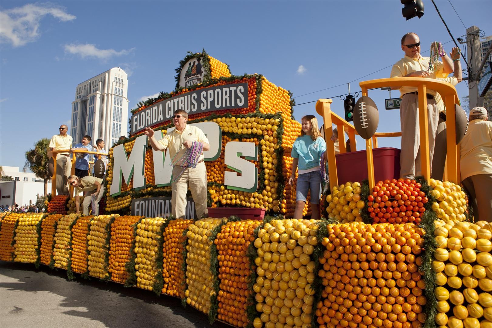 Over a mile of orangethemed floats will invade downtown Orlando for