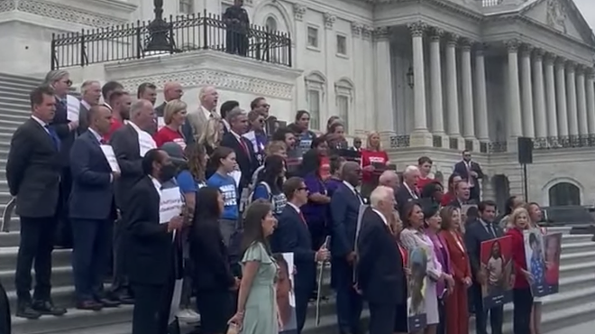 House Democrats singing on the steps.