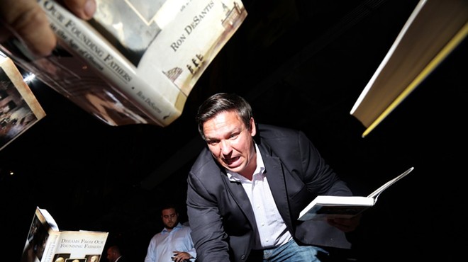 Ron DeSantis signs copies of his book "Dreams From Our Founding Fathers" at UCF