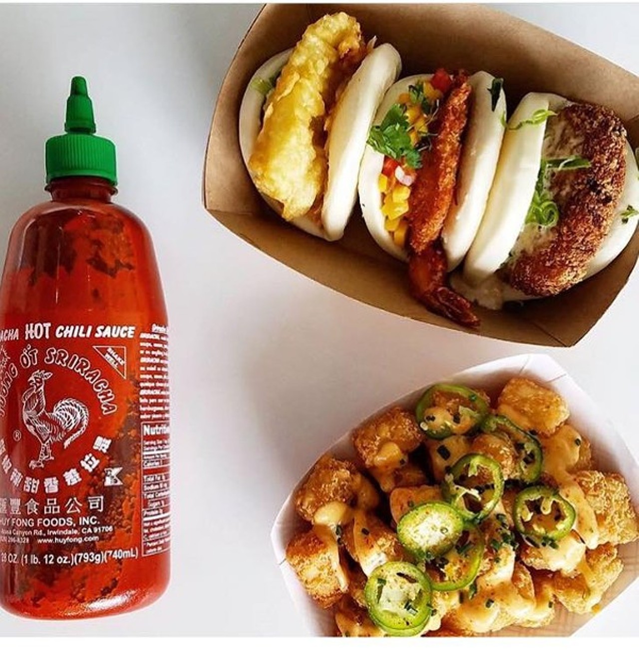 King Bao
710 N Mills Ave, Orlando, (407) 237-0013 
There's probably no better metaphor for Mills 50 than the Mr. Potato Head: a sweet-potato croquette topped with sour cream and roasted corn salsa, wrapped up in a soft, fluffy bao bun for $3.
Photo via Photo via King Bao/Facebook