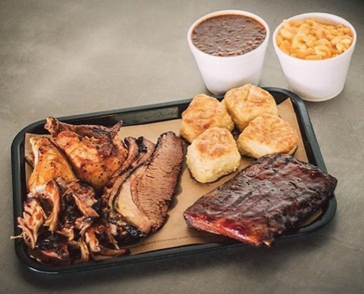 Try this: What they call the Happy Herd: chicken, ribs, pulled pork and brisket with two sides and biscuits. It&#146;s family-style, unless you believe in yourself hard enough. 
Photo via 4riverssmokehouse/ Instagram