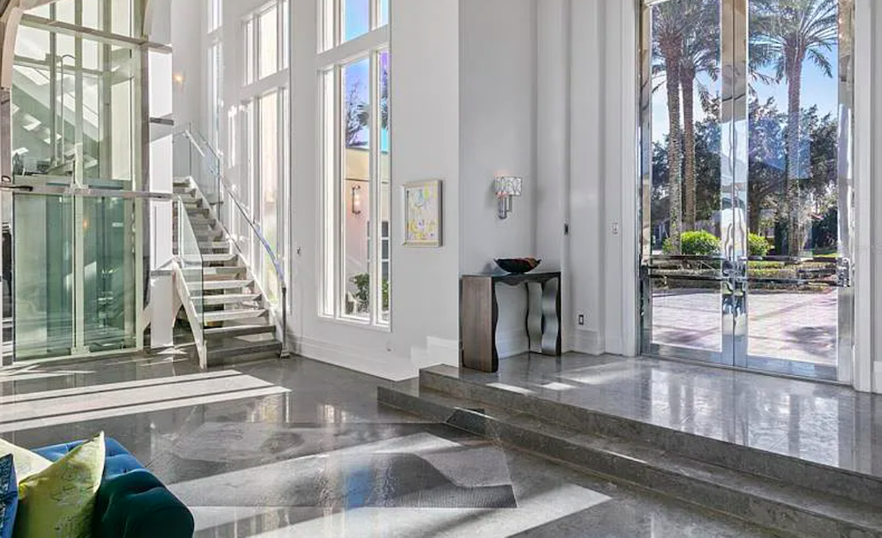 Orlando's $12 million 'Overjoy' home is an art-deco palace with its own custom theater and floating glass elevator