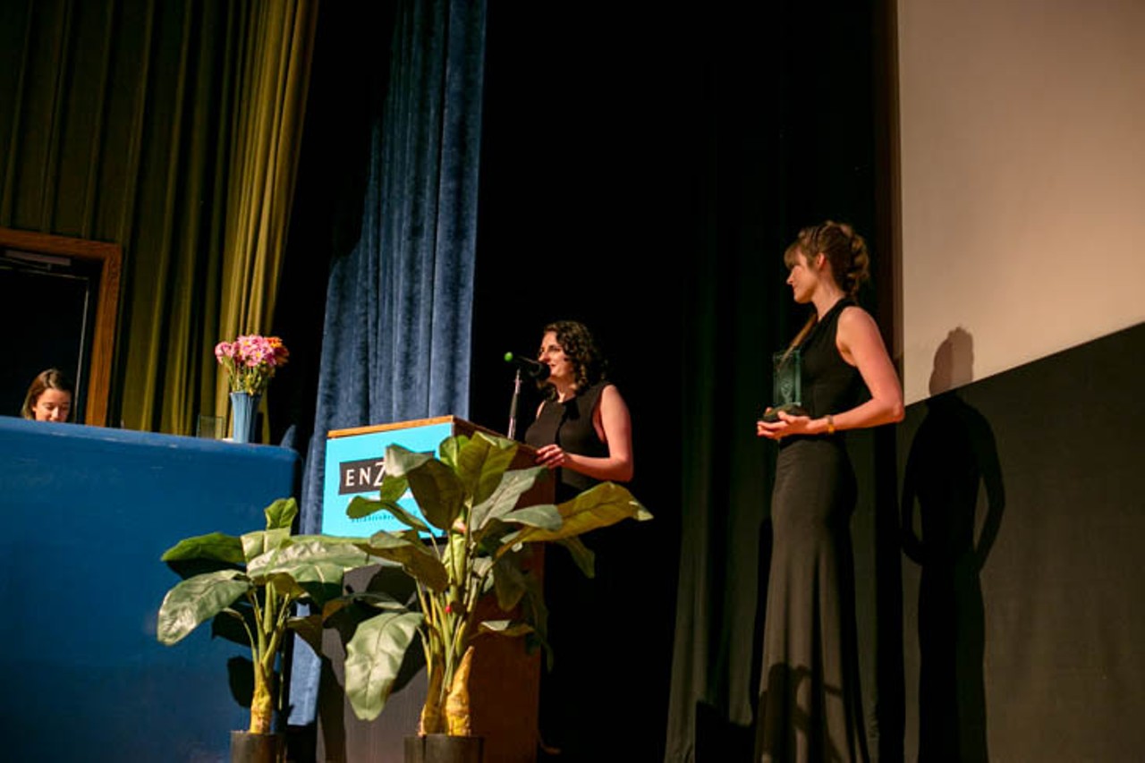 Shea Suzer (left) hosts the awards bash